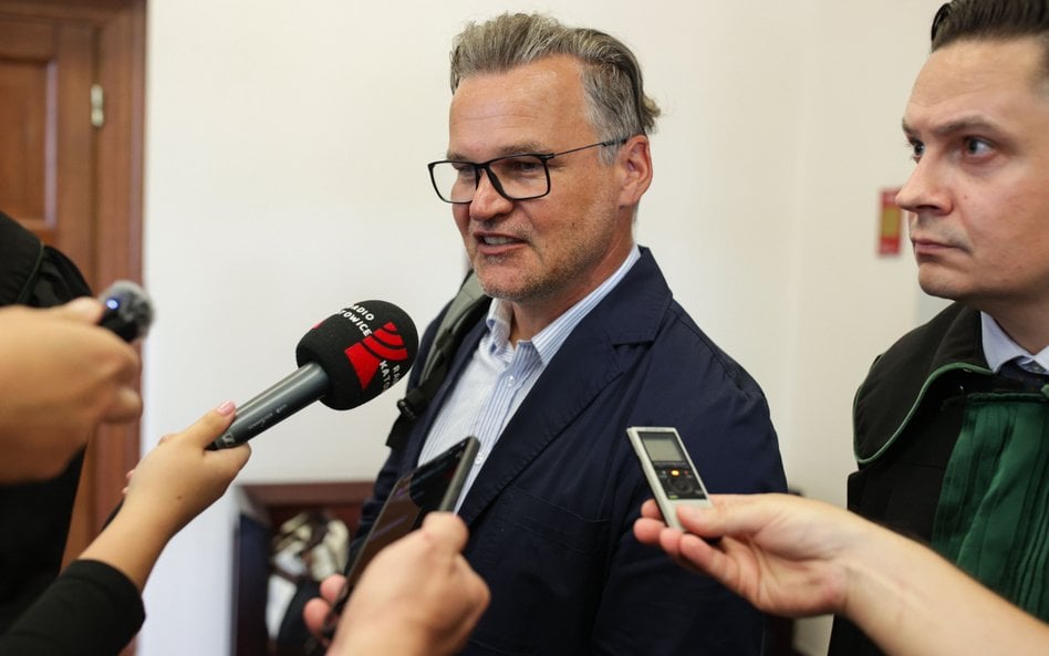 Dziennikarz Adam Kornacki (C) w Sądzie Apelacyjnym w Katowicach. Adam Kornacki i Patryk Mikiciuk byl