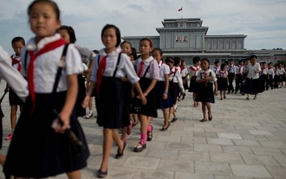 Chińscy turyści - cukierkami w Koreańczyków