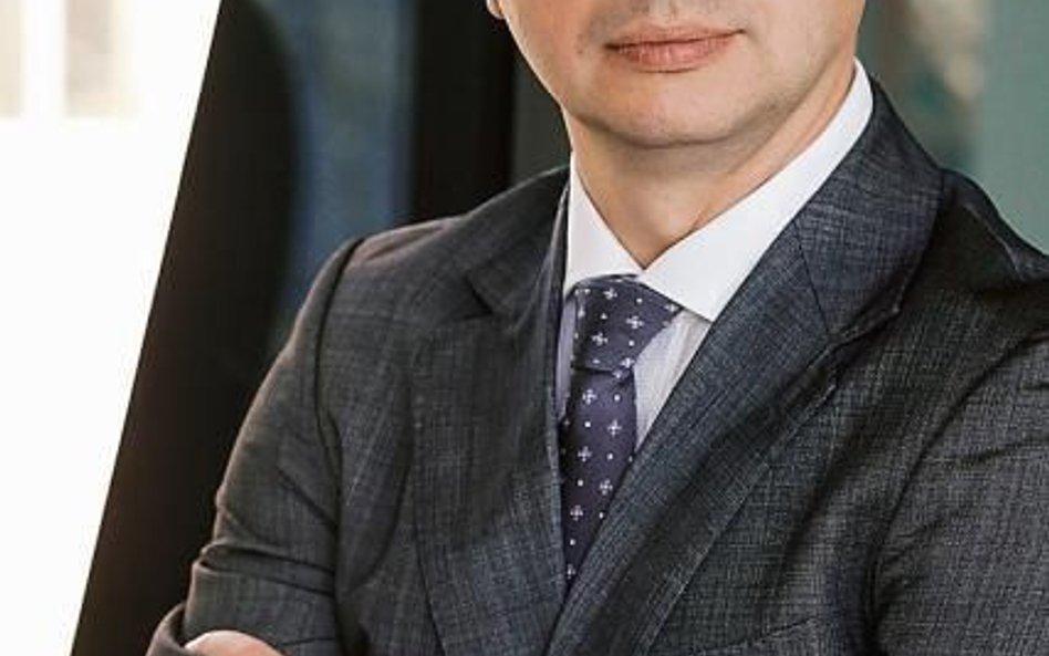 Arkadiusz Chojnacki, prezes Opti TFI.