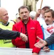 Szef „S” Piotr Duda (w środku) coraz częściej zastępuje protesty uliczne (jak ten w stolicy we wrześ
