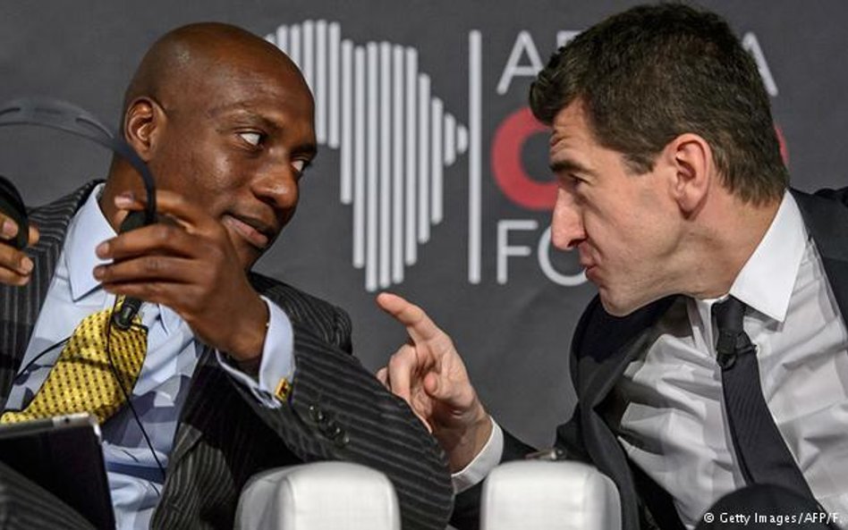 Dialog zawsze się opłaca. Od lewej: Oscar Onyema, szef giełdy w Nigerii, i francuski bankier i mened