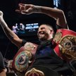 Andre Ward i jego trzy pasy mistrza świata.