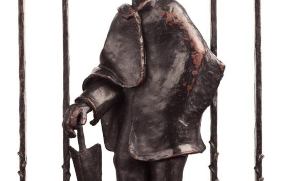 Jaroslav Vonka, Mężczyzna z parasolką, fragment kraty drzwi banku, ok.1930, Bank Zachodni WBK w Prud