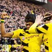 Pierre-Emerick Aubameyang (z lewej) i Marco Reus po zdobytej bramce przebrali się za Batmana i Robin