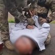 Kadr z nagrania przedstawiającego zatrzymanie domniemanego nowozelandzkiego szpiega