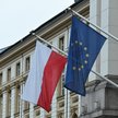 Flagi Polski i Unii Europejskiej na ulicach Warszawy