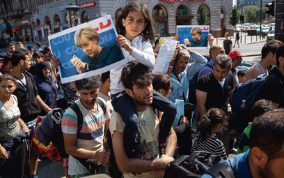 Angela Merkel dla koczujących w Budapeszcie imigrantów stała się symbolem polityka z ludzką twarzą