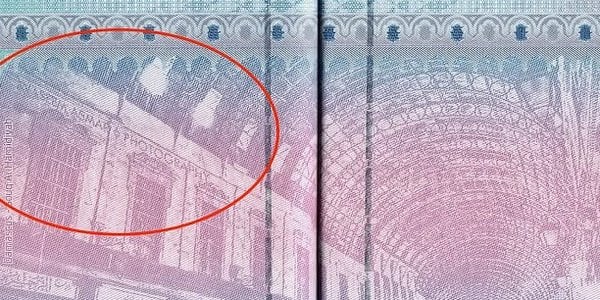 They Missed the Watermark When ‘Borrowing’ a Photo for Syria’s Passport. Now It Is Everywhere
