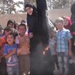 Syria: Kobiety świętują wyzwolenie spod rządów Daesh paleniem burek