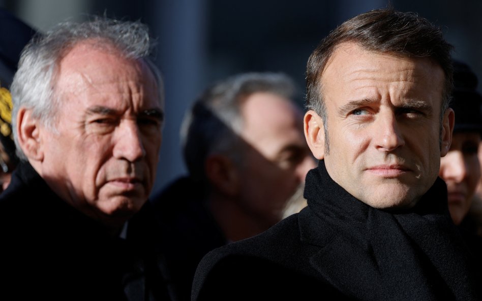 Francois Bayrou i Emmanuel Macron