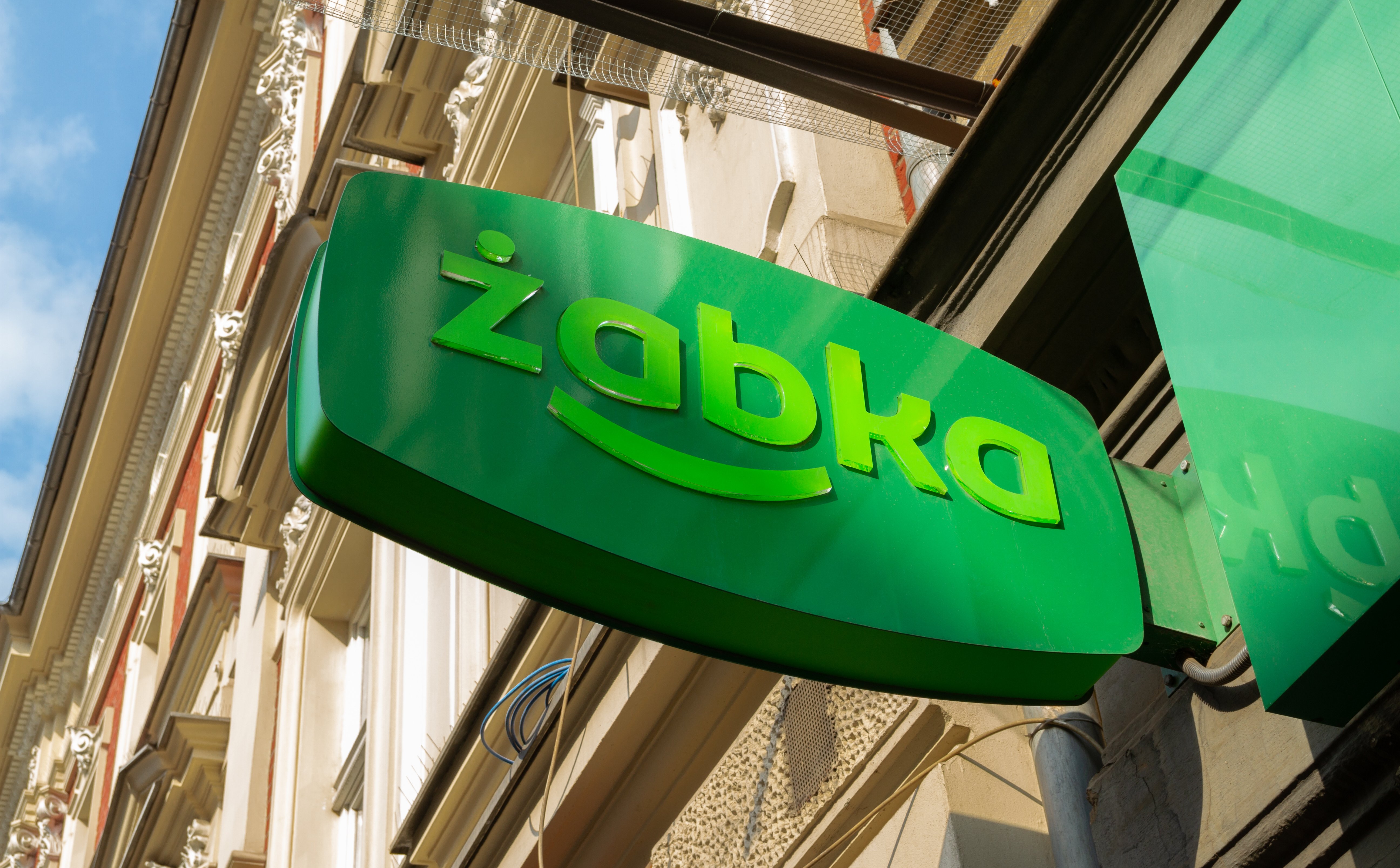 Przejęcie Żabki. Czy 32 zł to dobra cena? Analitycy i zarządzający komentują