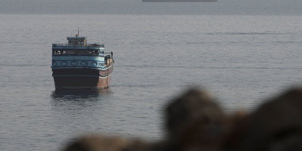The rocket  hit a ship in the Strait of Hormuz. It is not known who fired it