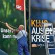 Wielcy rywale (choć na razie uczestnicy koalicji rządzącej): Frank-Walter Steinmeier z SPD i Angela 