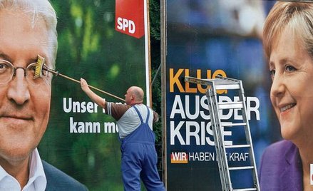 Wielcy rywale (choć na razie uczestnicy koalicji rządzącej): Frank-Walter Steinmeier z SPD i Angela 