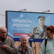 Billboard propagandowy w Moskwie, przedstawiający portret żołnierza rosyjskich sił zbrojnych Czyngis