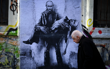 Mural bułgarskiego artysty Stanislava Belovskiego w Sofii. Przedstawia Władimira Putina niosącego wł