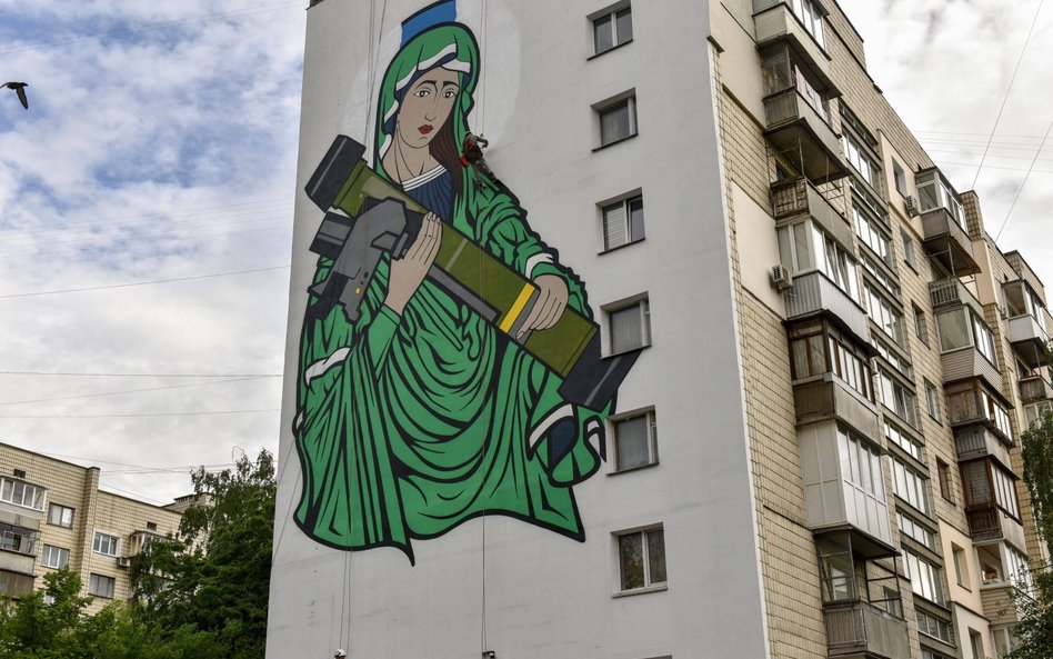 Mural ze „Świętą Javelin” w Kijowie. Amerykańska wyrzutnia pocisków przeciwpancernych FGM-148, zwana