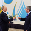 Rosyjski przywódca Władimir Putin na spotkaniu z szefem MKOl Thomasem Bachem w 2014 roku w Soczi