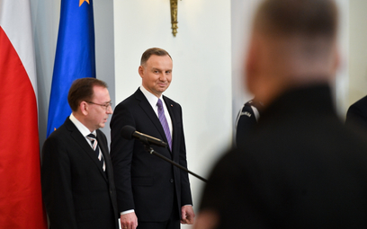 Minister spraw wewnętrznych i administracji Mariusz Kamiński i prezydent RP Andrzej Duda