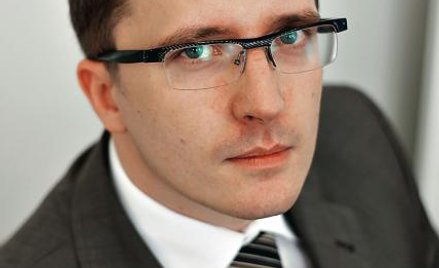 Piotr Kalisz, główny ekonomista Banku Handlowego. Prognozy przygotowuje razem z ekonomistą Cezarym C