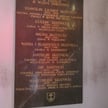 Tablica zawieszona na ścianie kruchty kościoła pod wezwaniem św. Jana Chrzciciela w Skotnikach upami