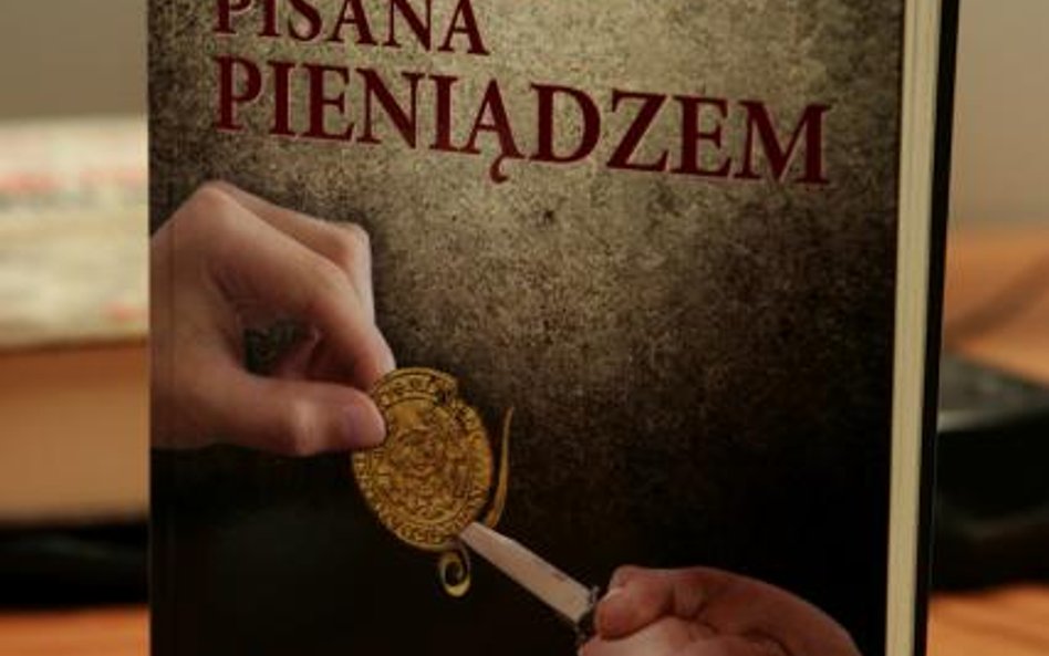 Historia pisana pieniądzem Jakub Woziński