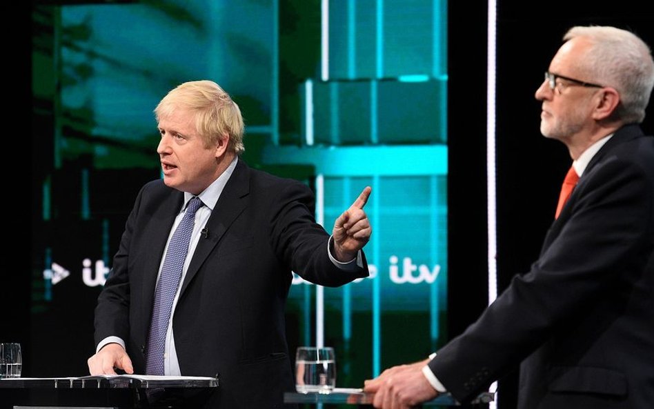 Lider torysów Boris Johnson i przewodniczący Partii Pracy Jeremy Corbyn w czasie debaty w telewizji 