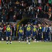Zawodnicy Fenerbahce opuszczający boisko