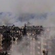 Telewizja Shaam News Network pokazuje zniszczenia w Homs w Syrii