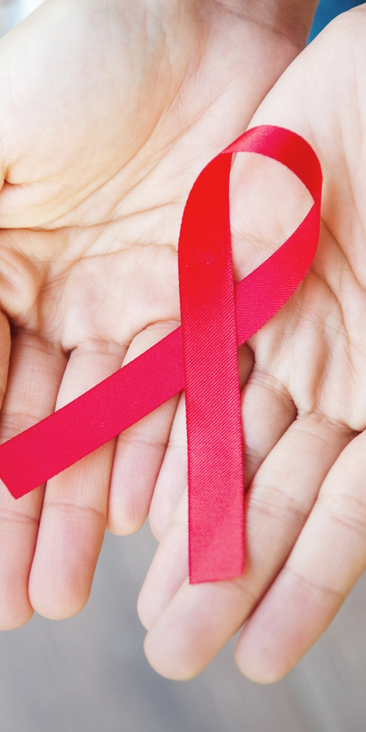 Czerwona wstążka. Symbol solidarności z żyjącymi z HIV i AIDS