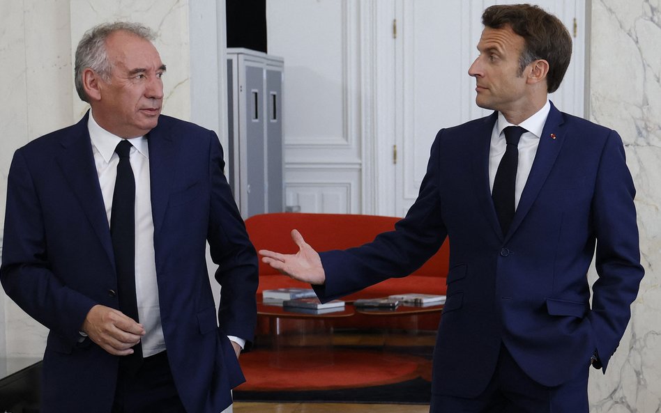 Francois Bayrou i Emmanuel Macron