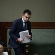 Minister finansów Andrzej Domański (P) na sali obrad Sejmu.