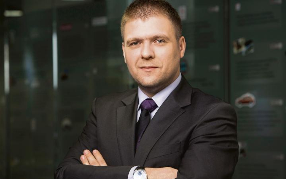 Paweł Przybyłek, dyrektor w mBanku.