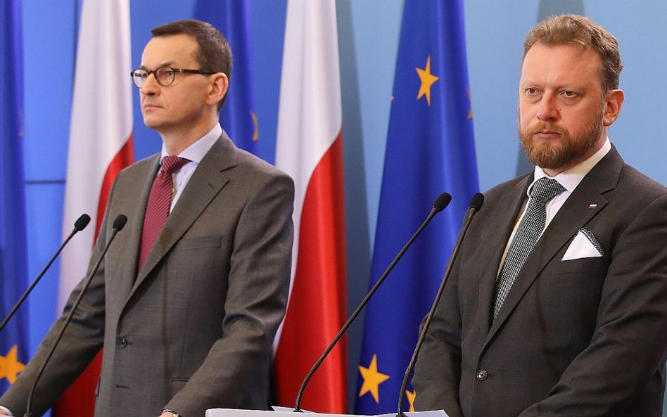 Premier Mateusz Morawiecki i minister zdrowia Łukasz Szumowski