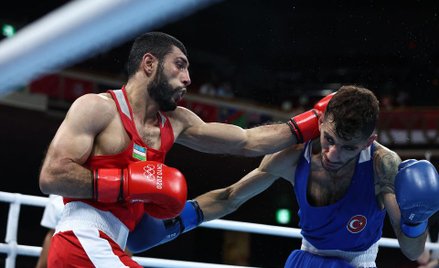 Szachobidin Zoirow (w czerwonym stroju) w walce z Turkiem Batuhanem Ciftcim