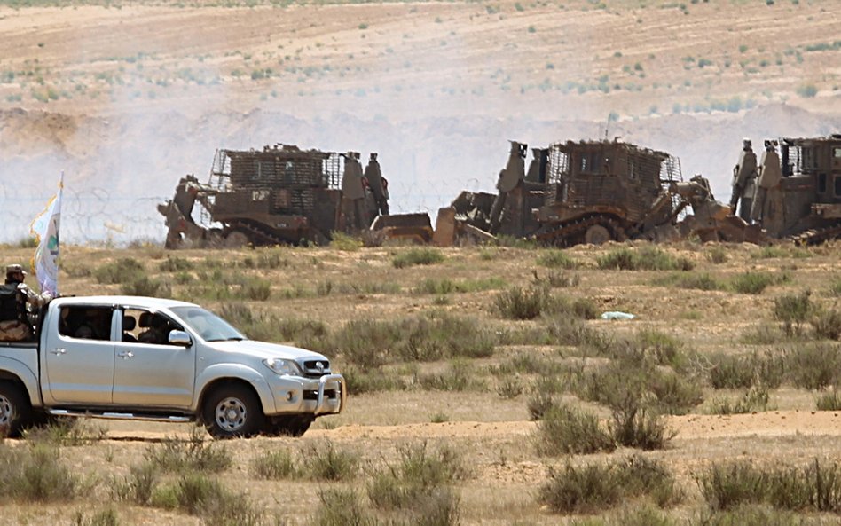 Bojownicy Hamasu i wojsko Izraelskie