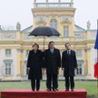 Angela Merkel, Bronisław Komorowski, Nicolas Sarkozy i słynny parasol, Wilanów, 7 lutego 2011 r.