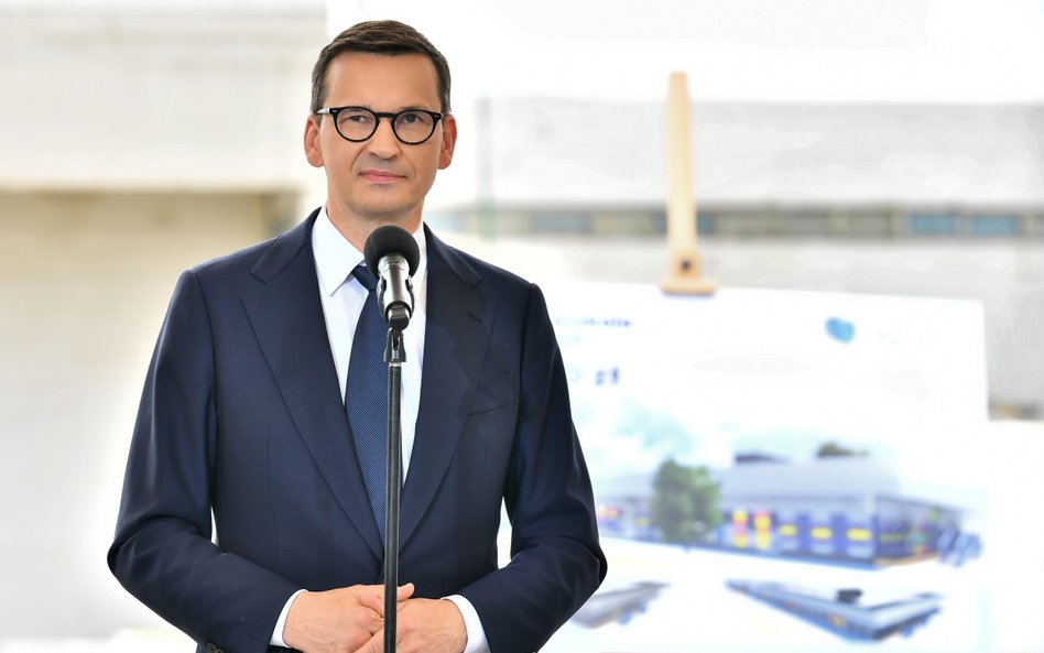 Premier Mateusz Morawiecki na terenie budowy przedszkola w Łagiewnikach