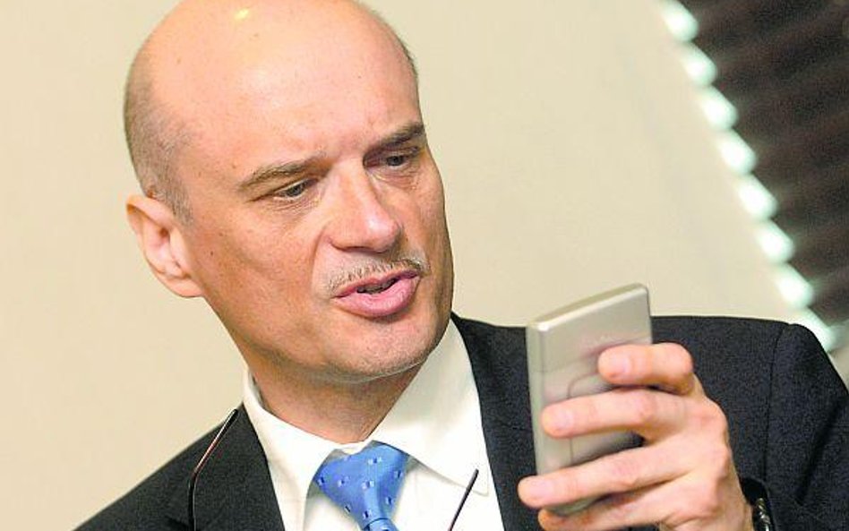 Zyski ze sprzedaży akcji Polkomtelu kierowanego przez Jarosława Bauca (u góry) mogą się okazać ważną