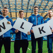 Piłkarze Lecha w trakcie kampanii promocyjnej (od lewej): Hubert (W)ołąkiewicz (obecnie Cracovia), K
