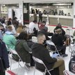 Pasażerowie na lotnisku w Japonii