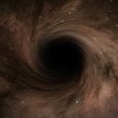Astronomowie po raz pierwszy zmierzyli masę uśpionej czarnej dziury z wczesnego wszechświata / zdjęc