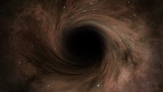 Astronomowie po raz pierwszy zmierzyli masę uśpionej czarnej dziury z wczesnego wszechświata / zdjęc