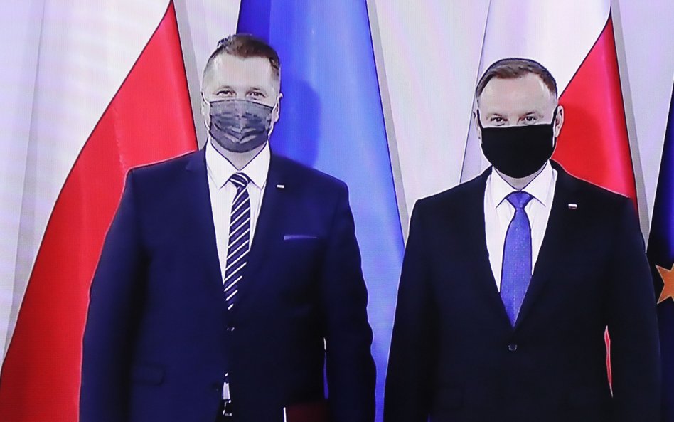 Prezydent RP Andrzej Duda (P) i minister edukacji Przemysław Czarnek (L)