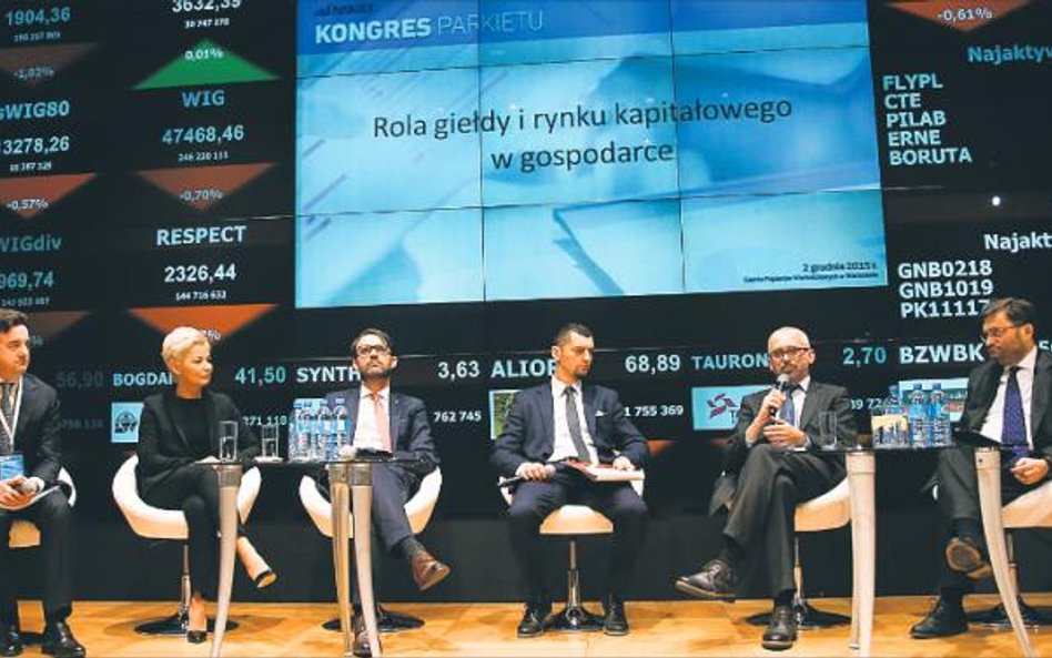 Od lewej: Tomasz Bardziłowski (wiceprezes Vestor DM), Iwona Sroka (prezes KDPW), Filip Paszke (dyrek