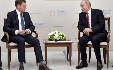 Władimir Putin w czasie spotkania z premierem Saksonii Michaelem Kretschmerem na forum gospodarczym 