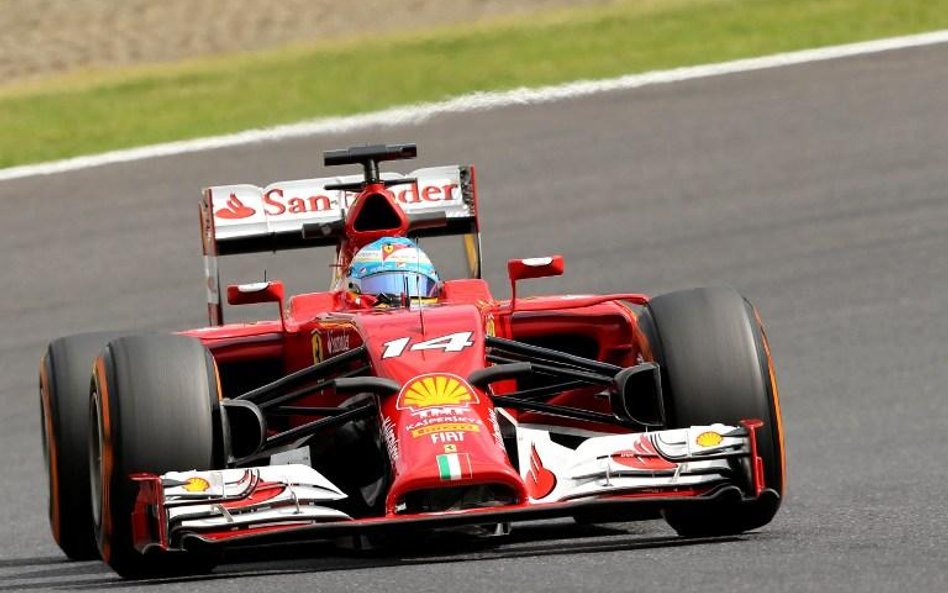 Fernando Alonso w czerwonym bolidzie Ferrari - czy GP Japonii będzie jednym z ostatnich wyścigów His