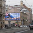 Plakat na ulicy Petersburga zachęcający do służby w rosyjskiej armii