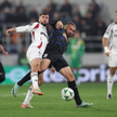 Legia Warszawa players Jurgen Celhaka and Ifet Dakovac of FK TSC Backa Topola (in the middle) during the match