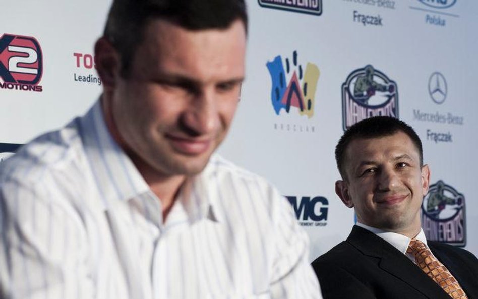 Witalij Kliczko i Tomasz Adamek